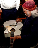 Crosby signing guitar